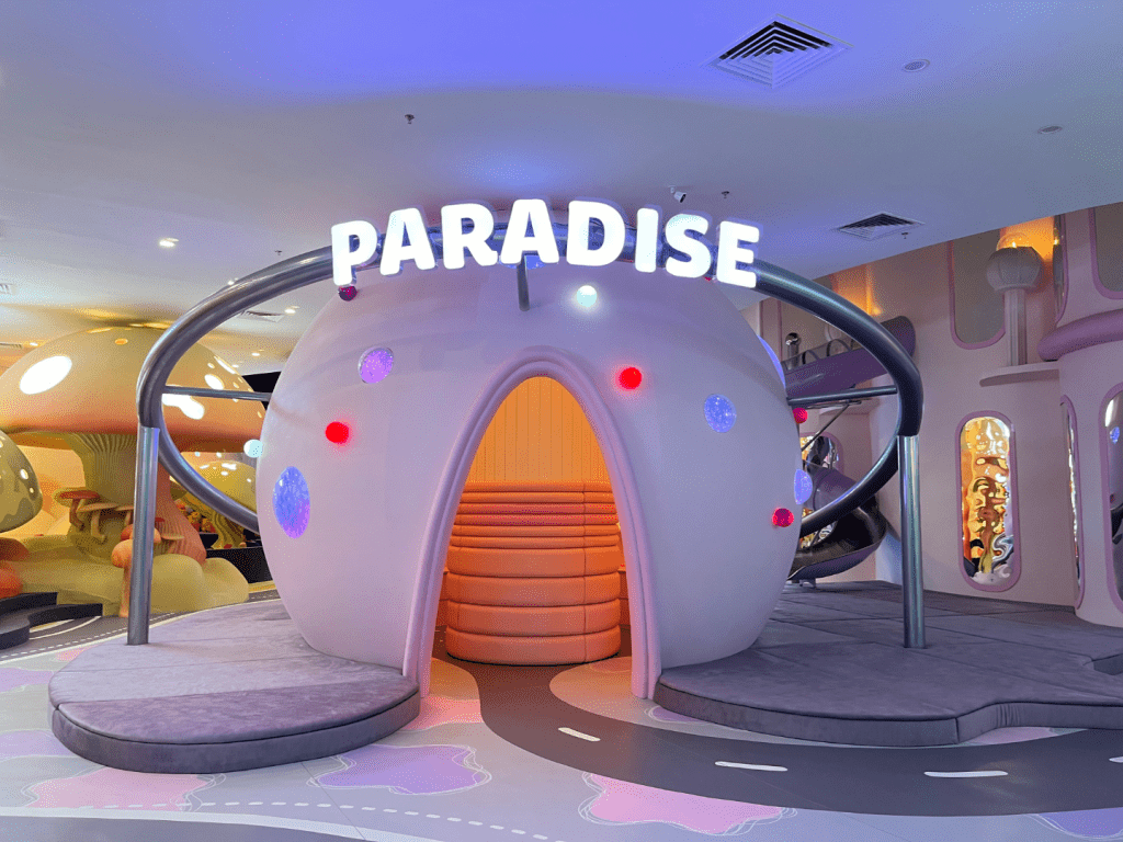 Children playing among the soft-foam mushroom canopies of UFOREA's Little Paradise